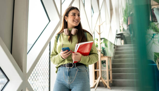 istock Young smiling college girl 2194370254