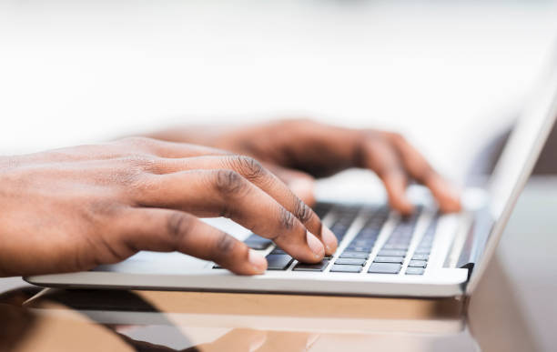 istock Hands Typing on a Laptop During a Quiet Work Session in a Bright Environment 2194372030