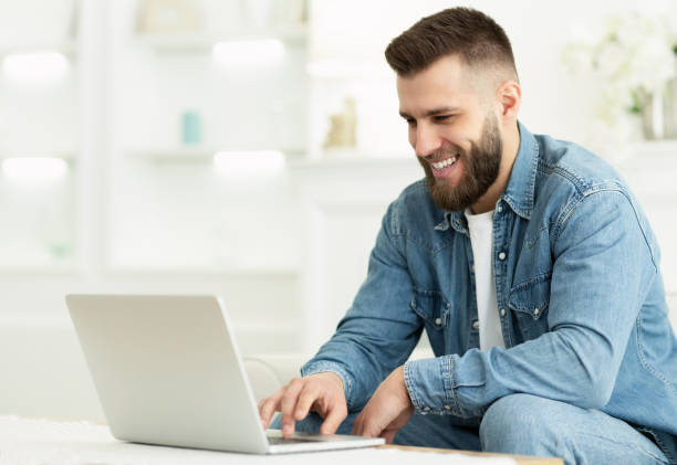 istock Freelancer Man Working On Laptop Online At Home 2194372849