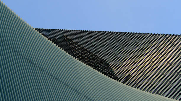 istock Dynamic Architectural Overlap - Diagonal Structures and Play of Shadows, Perfect for Modern Branding, Urban Design Projects, or Abstract Art Concepts 2194377839