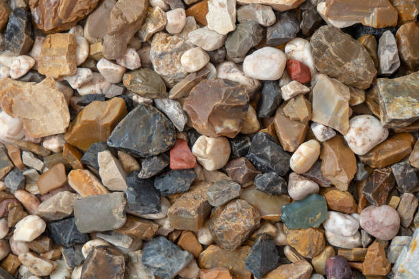 istock Natural colorful pebbles. Abstract stone background, texture. Stone beach. 2194379033