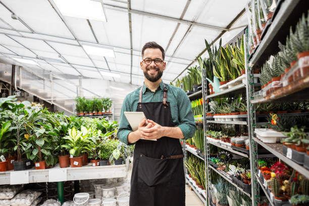 istock Garden Center Worker in Action 2194381923