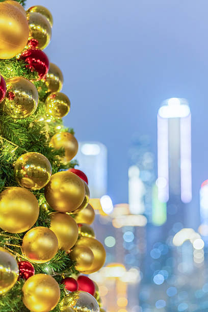 istock decorated christmas tree with modern cityscape and skyline, sky for copyspace. 2194383212