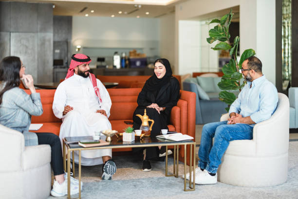 istock Diverse Arabic Business Executives in Modern Hotel Lobby Meeting 2194383563