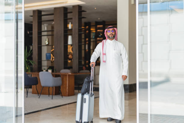 istock Confident Middle-Aged Arabic Businessman Departing Hotel Lobby 2194383743