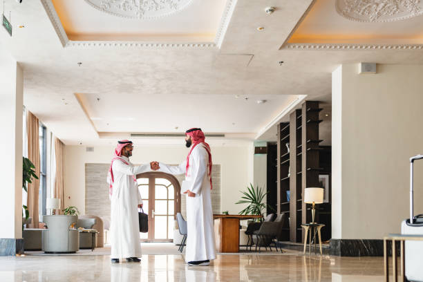 istock Collaborative Arabic Businessmen in Elegant Hotel Lobby 2194383799
