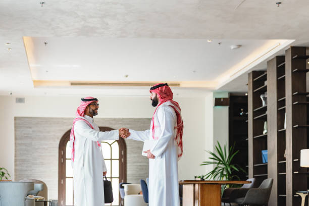 istock Confident Arabic Businessmen in Elegant Hotel Lobby 2194383800