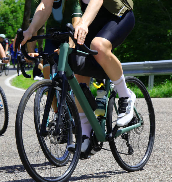 istock cycling race with cyclists pedaling vigorously and energetically on high-performance racing bikes 2194384459