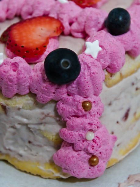 istock Pink berry cake with decorative frosting 2194385408