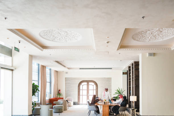 istock Diverse Arabic Business Executives in Modern Hotel Lobby Meeting 2194386232