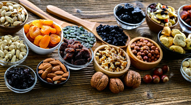 istock Composition with a variety of dried fruits and assorted nuts. 2194386391