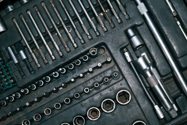 istock Close-up of a toolset including various screwdrivers, sockets, and extensions in a compact organizer. Metallic tools neatly arranged, suitable for repair work 2194386748