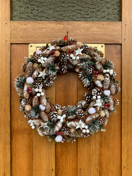 istock A beautiful Christmas wreath hanging on the door 2194386830