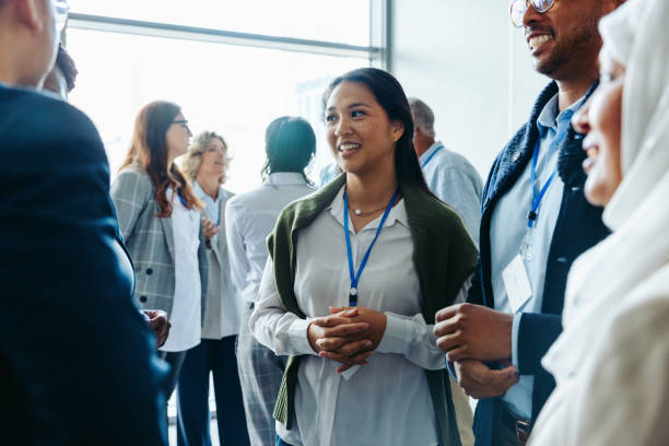 istock Diverse business professionals networking at a conference event 2194386980
