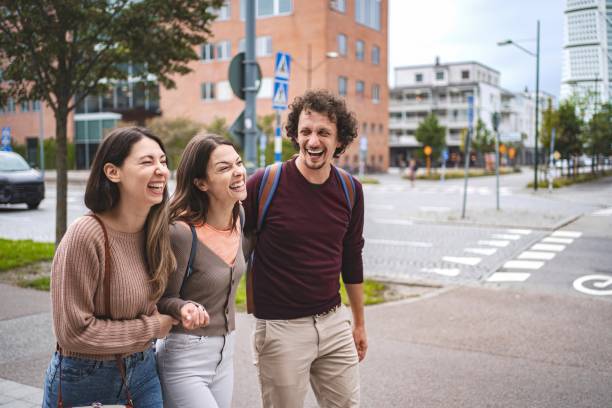 istock Happy tourists laughing and walking in malmo, sweden 2194388819