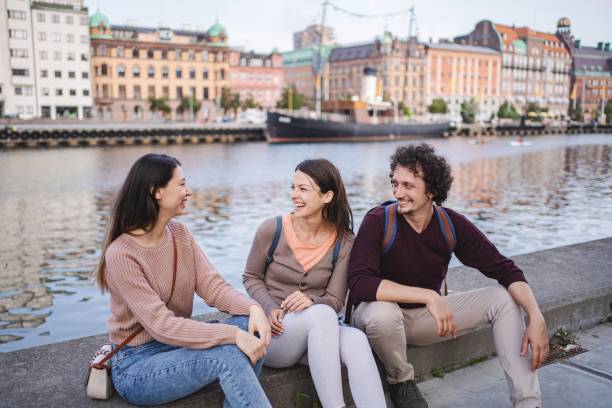 istock Tourists relaxing and chatting in malmo, sweden 2194388956