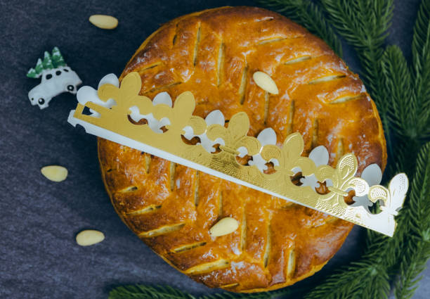 istock Royal biscuit with crown on dark stone background. 2194389294