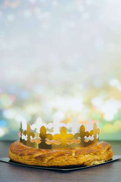 istock Whole almond royal galette with crown on table with bokeh. 2194389629