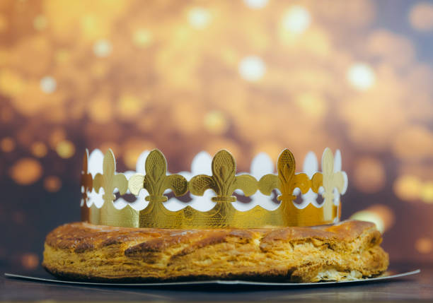 istock Whole almond royal pie with crown on stone table with bokeh. 2194391028