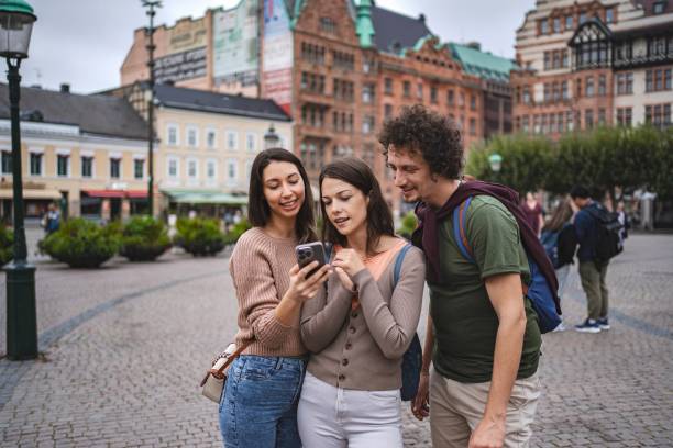 istock Tourists using smartphone app in malmo, sweden, exploring the city 2194391812