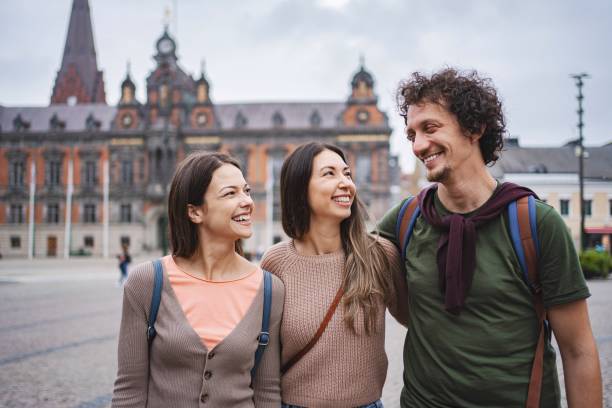 istock Tourists walking and talking in malmo, sweden 2194391822