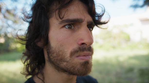 istock Long Hair Man Angry Internally Outdoors In Nature 2194392144