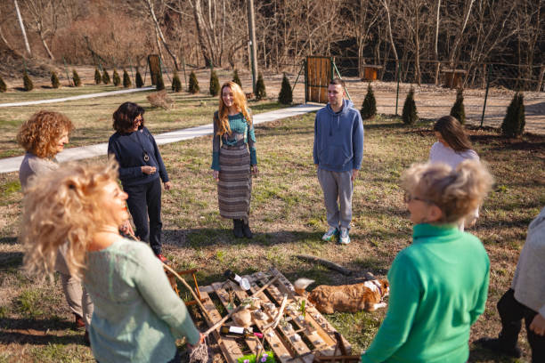 istock Woman leading group psychotherapy session 2194392935