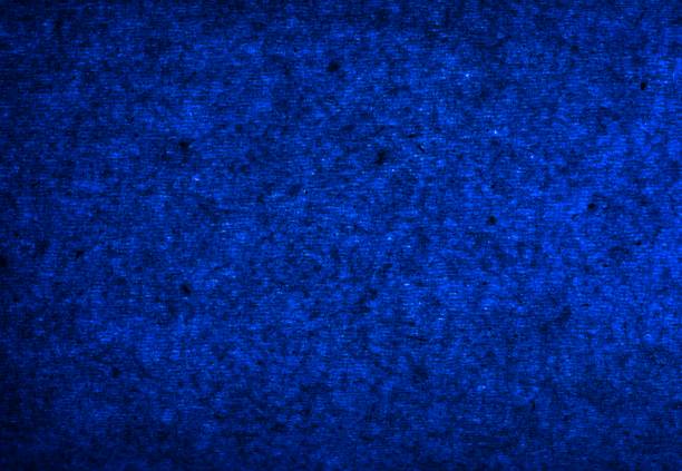 Blue abstract texture of light through a paper napkin
