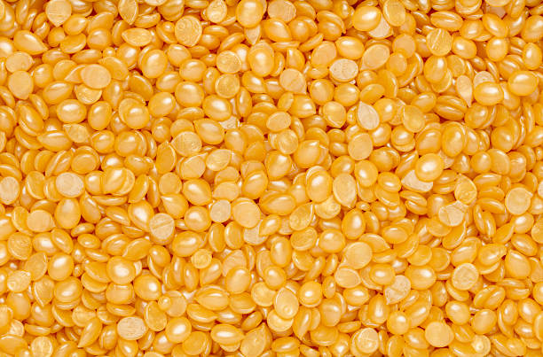 Macro background photography of cosmetics hard wax beads, waxing, hair removal, depilation, spa salon, beauty procedure, advertisement