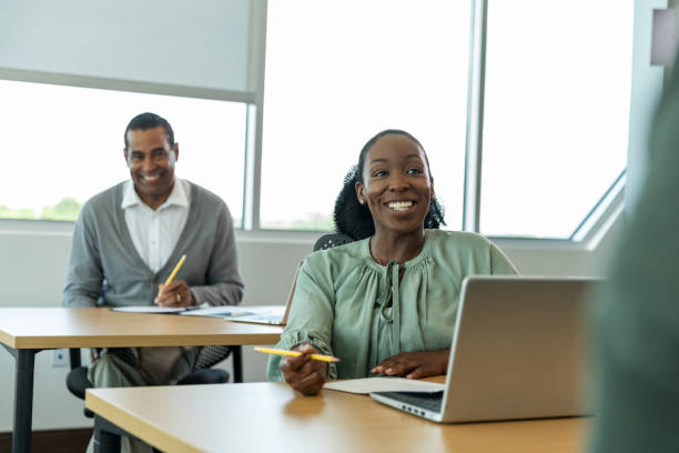 istock Confident African-American woman smiling during a classroom discussion 2194401479