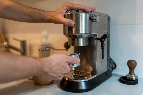 istock Barista Preparing Espresso with a Modern Coffee Machine 2194401598