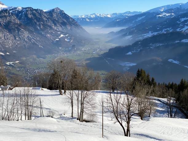 istock Winter atmosphere in spacious subalpine valley Seeztal along the Seez River between Lake Walensee and the Rheintal Valley, Walenstadtberg - Canton of St. Gallen, Switzerland (Schweiz) 2194402835