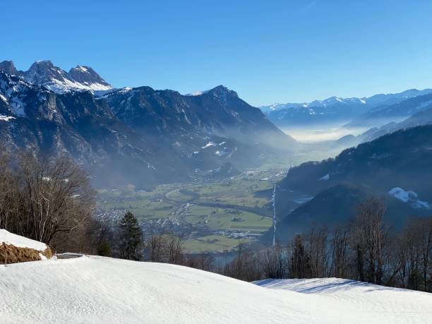 istock Winter atmosphere in spacious subalpine valley Seeztal along the Seez River between Lake Walensee and the Rheintal Valley, Walenstadtberg - Canton of St. Gallen, Switzerland (Schweiz) 2194402836