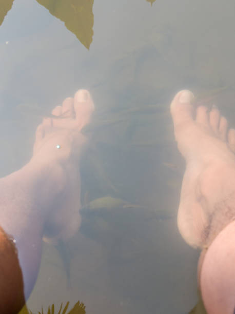 istock Peaceful underwater view of feet resting on a submerged surface 2194405893