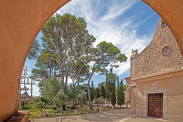 istock Courtyard of a famous Mallorcan monastery with green shutters 2194406422