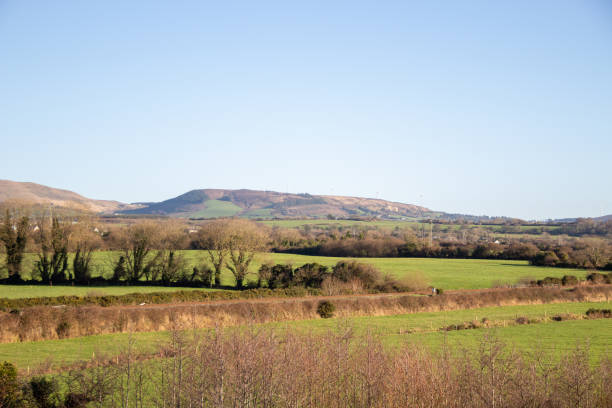 istock Water canal with mountains and mill in Tralee 2194412535