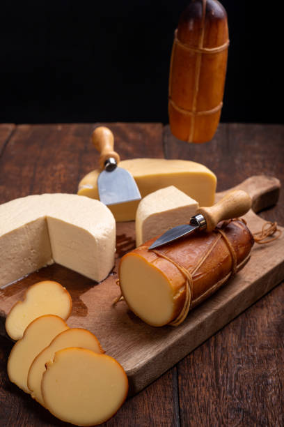 istock Table with cheeses, delicious cheeses from Brazil on a rustic wooden table, selective focus. 2194415262