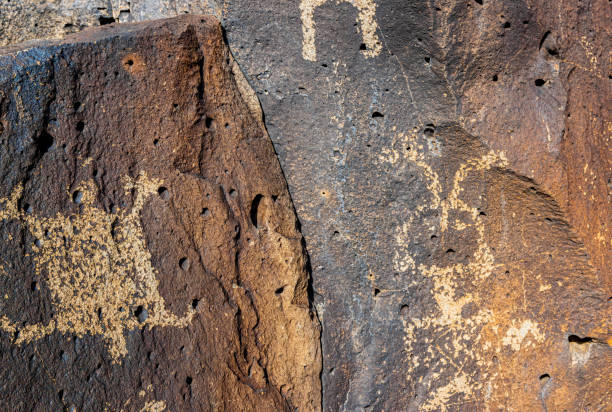 istock Ancient Native American Symbols Carved on Rock Panels, 2194423031