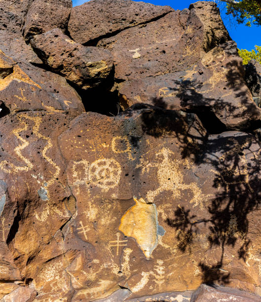 istock Ancient Native American Symbols Carved on Rock Panels, 2194423090