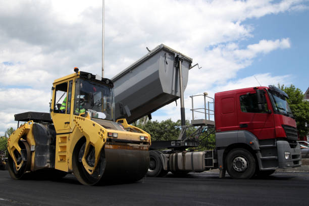 istock Large road-roller paving a road. Road construction 2194423240