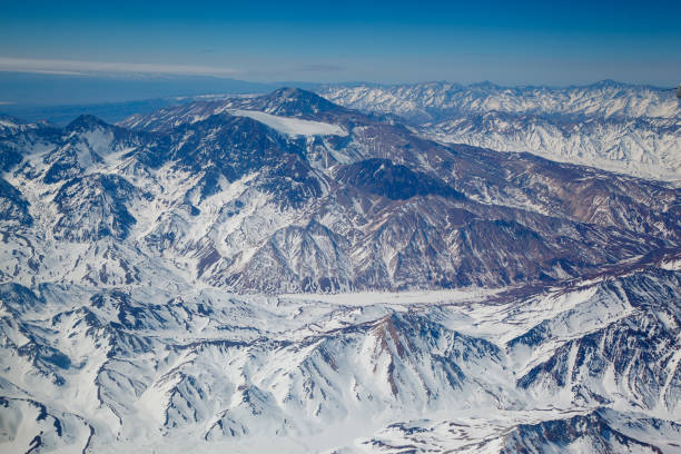 The Snowcaped Andes Mountains from the airplane window, Chile