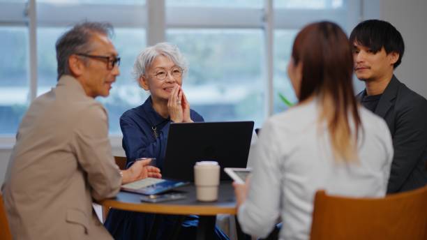 istock Diverse Business Team in a Collaborative Meeting 2194436612