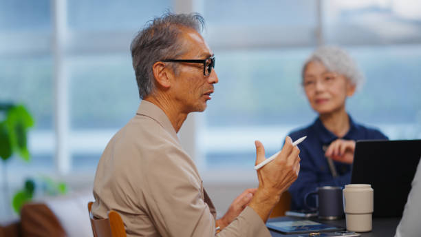 istock Diverse Business Team in a Collaborative Meeting 2194436808