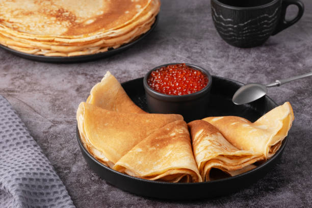 istock Freshly baked pancakes with red caviar 2194443306