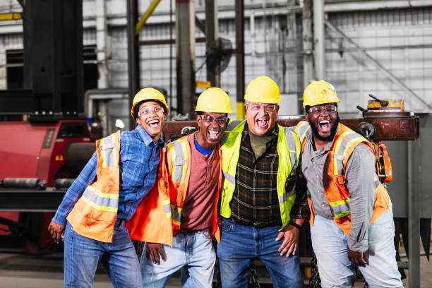 istock Four multiracial workers in steel fabrication factory 2194444532