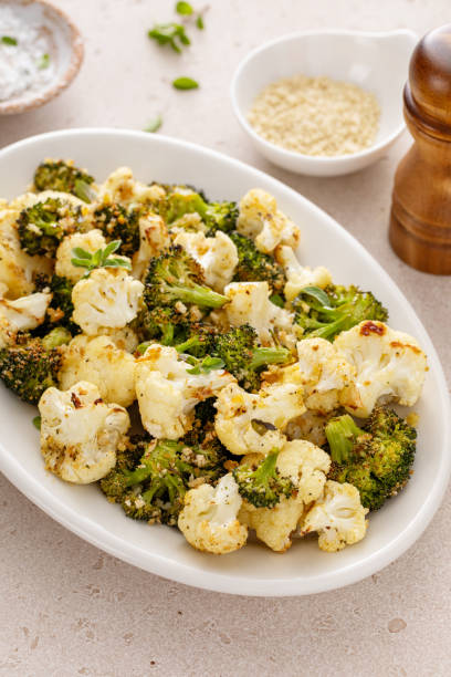 istock Roasted cauliflower and broccoli on a serving plate, healthy vegetable side dish 2194445594