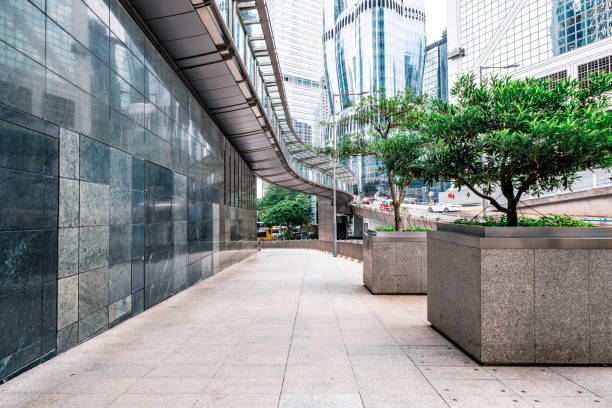 istock Empty pavement front of central district of hong kong 2194446231