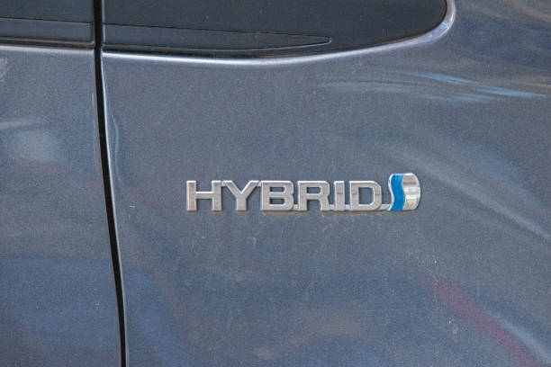 Belgrade, Serbia - December 08, 2024: 3d Silver Sign Hybrid Powered Vehicle at Toyota Japan Car.