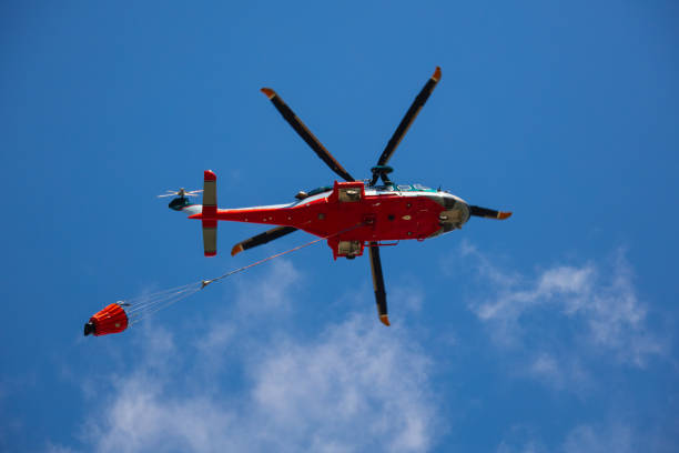 istock Rescue helicopter in the blue sky 2194453030