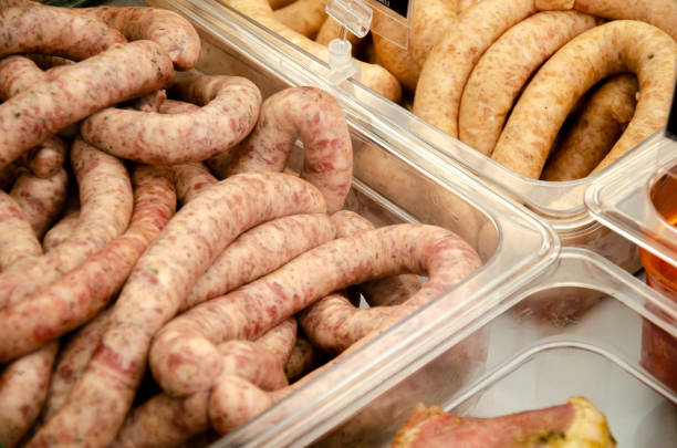 istock A showcase with sausage and meat products behind glass 2194453782